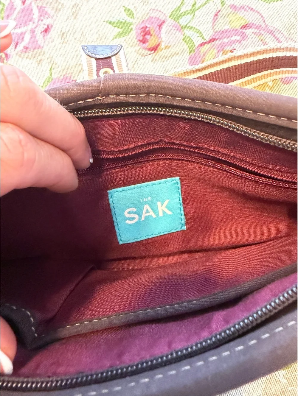 The Sak Brown Leather Shoulder Bag with Striped Strap and Tassel